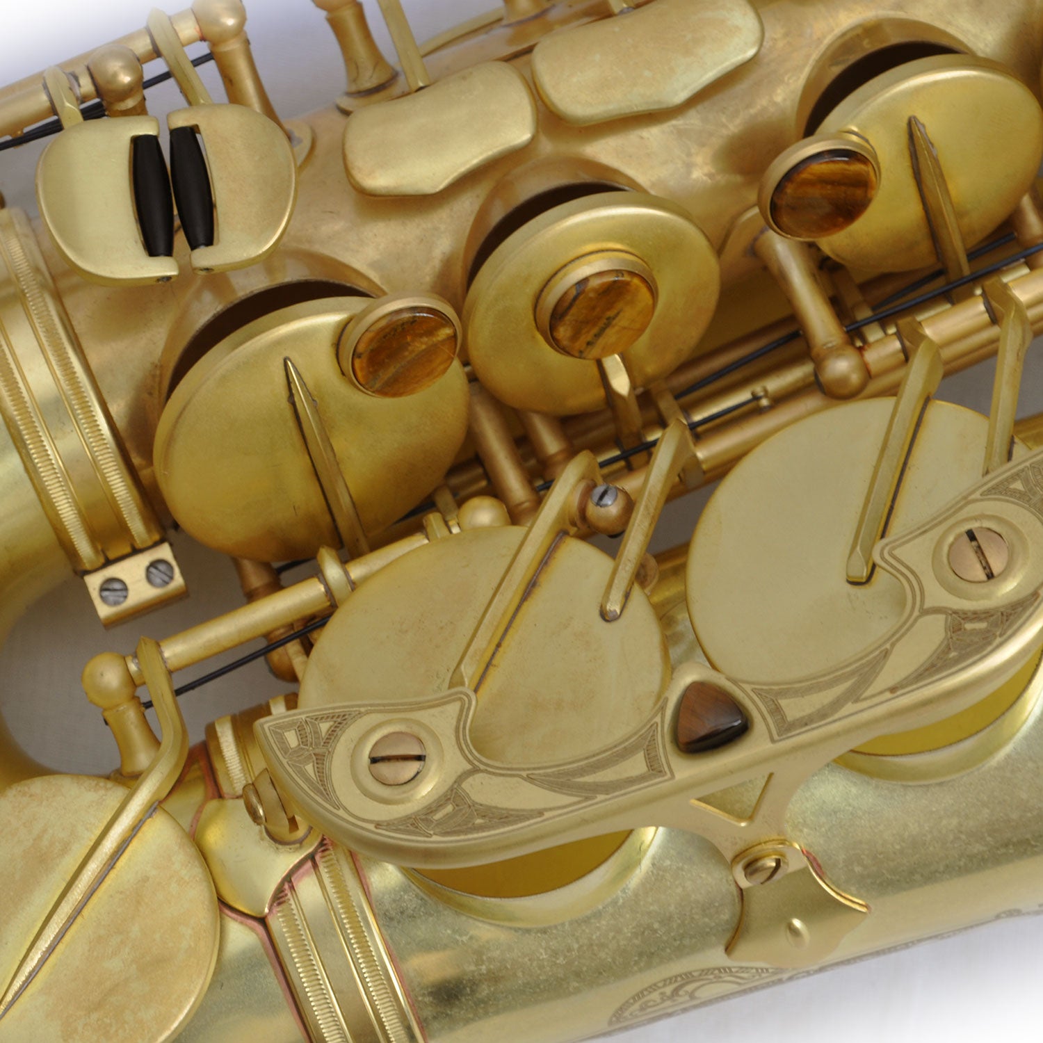 Close-up of Cannonball A4 Mad Meg alto saxophone bell and hand engraving