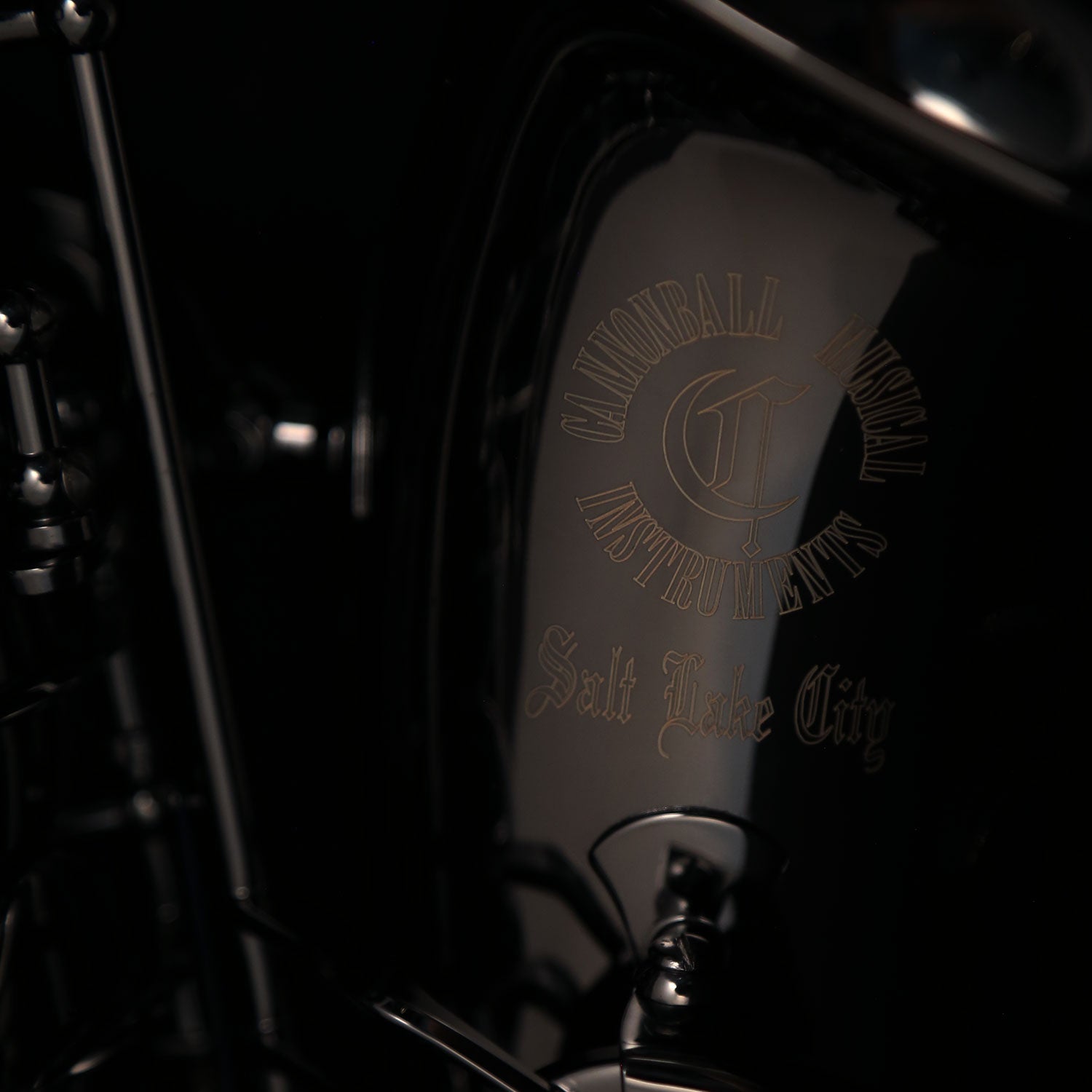 Close-up of Cannonball A5-B black nickel alto saxophone bell and engraving