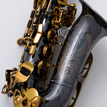 Close-up of Cannonball A5-BL alto saxophone black nickel body and gold lacquer keywork